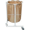 Trolley to hold bag for collection and transportation of soiled linen across a hospital facility